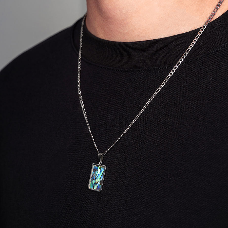 Our Premium Rectangle Pendant paired with our Signature Figaro Chain is the perfect touch of Silver & Opal.